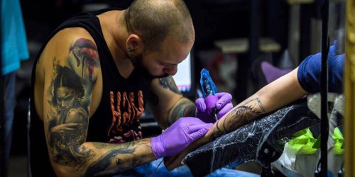 Signs To Run, Not Walk, Out Of A Tattoo Studio (And How To Choose The Right Artist For You)