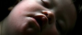 When do babies with down syndrome crawl