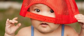 How should you dress your baby during the summer?