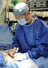 Abdominal hernia repair with surgery