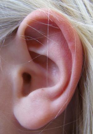 What causes ear wax